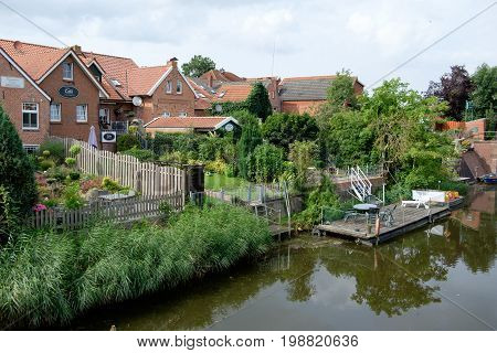 the small village of ditzum at the river ems