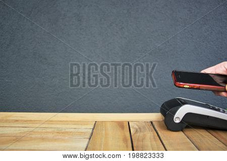 contactless payment smartphone phone pdq nfc background with copy space