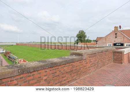 the small village of ditzum at the river ems