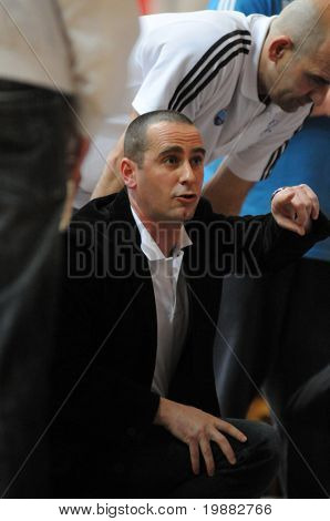 KAPOSVAR, HUNGARY - APRIL 16: Adam Fekete (Kaposvar teamÃ¢??s trainer) at a Hugarian Champonship basketball game Kaposvar vs. Nyiregyhaza April 16, 2010 in Kaposvar, Hungary.