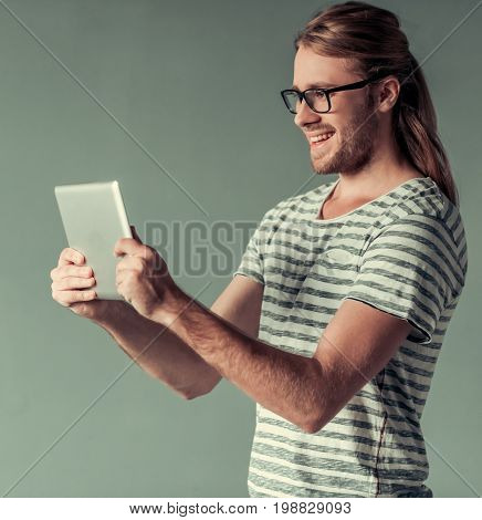 Young Man With Gadget