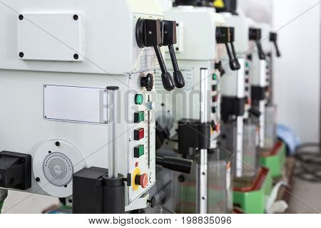 Benchtop vertical drilling machines. Black Lever Controls.