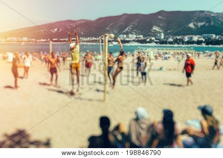 Blurred Volleyball Match On Beach In Summer. Holiday Beach Summer Enjoyment Concept