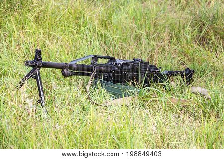 Machine gun Pecheneg. The Machinegun is in the grass. Served in the Russian Army