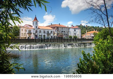 View of old city of Tomar in Portugal with the river in the foreground