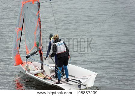 ST. PETERSBURG, RUSSIA - JULY 5, 2017: Training in sailing on 29er dinghy in the Gulf of Finland near the yacht club of St. Petersburg. Yacht club organizes sailing classes and holds sports regattas