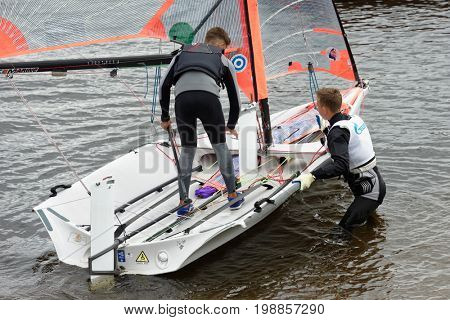 ST. PETERSBURG, RUSSIA - JULY 5, 2017: Training in sailing on 29er dinghy in the Gulf of Finland near the yacht club of St. Petersburg. Yacht club organizes sailing classes and holds sports regattas