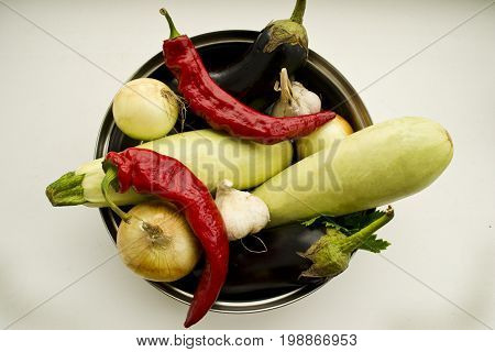 Summer vegetables in a bowl ready for cooking