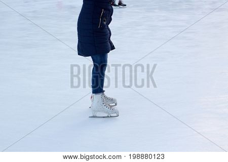 the gerl rides on ice in skates