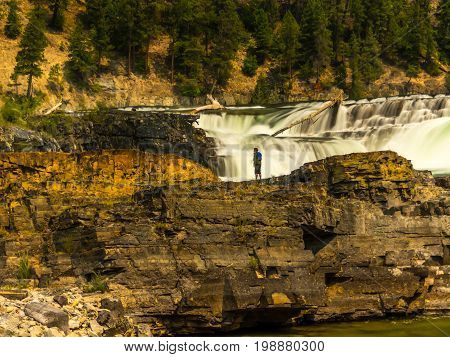 Fishing for Bull Trout beneath the falls.
