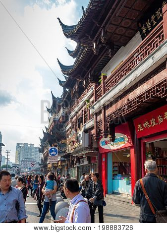 Shanghai, China - Nov 6, 2016: On Fangbang Middle Road - old residential buildings with architectural structures faithfully restored to the traditional Chinese styling and converted into modern-day commercial stores.
