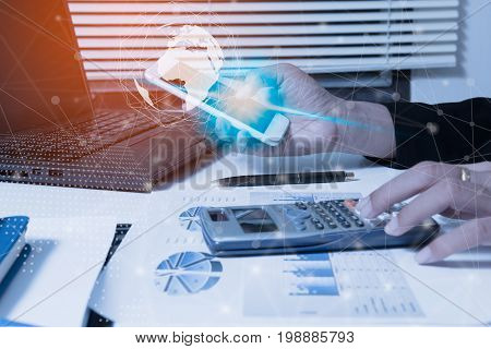 Businessman check seriously analyzes a finance report investor colleagues discussing new plan financial graph data. bank managers task. Concept business and finance Account analyzes planing