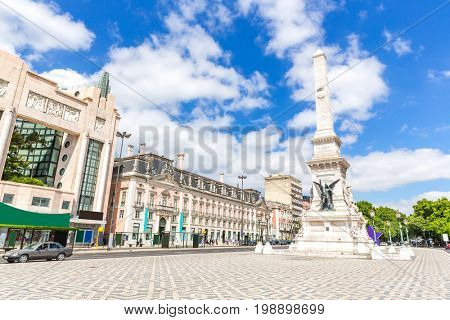 Restauradores Square with Monument to the Restorers Lisbon, Portugal