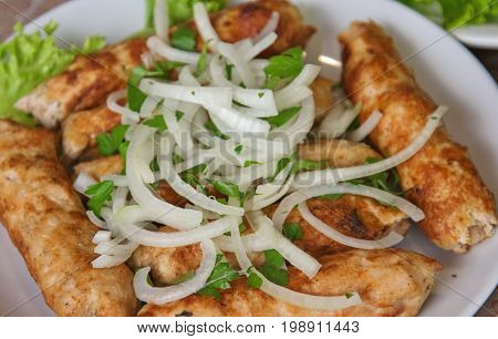 Luleh Kebab, Traditional Ethnic Meat Dish, With Onion And Grocery