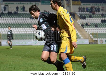 KAPOSVÁR, Maďarsko - 24. listopadu: Jozsef Zsok (31) v akci na maďarská Liga Cup Fotbal Kapo