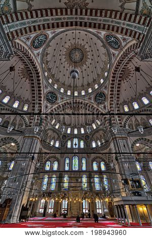 Istanbul Turkey - April 21 2017: Fatih Mosque a public Ottoman mosque in the Fatih district Turkey with prayers waiting for Asr prayers