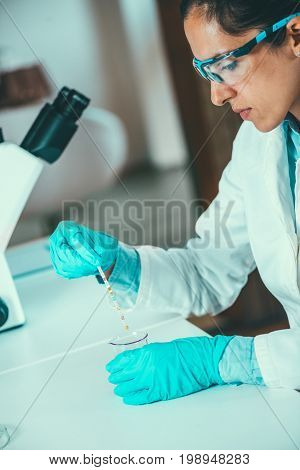 Lab Technician With Urine Sample In Laboratory, Toned Image, Selective Focus