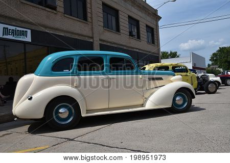 CASSELTON, NORTH DAKOTA, July 27, 2017: The annual Casselton Car Show which occurs the last Thursday of July features classic vehicles such as the restored 1937 four door Chevy