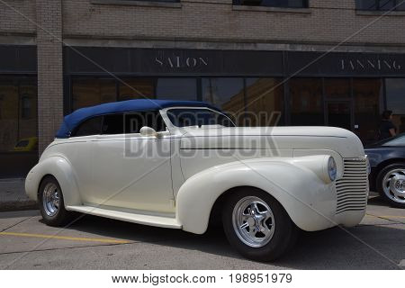 CASSELTON, NORTH DAKOTA, July 27, 2017: The annual Casselton Car Show which occurs the last Thursday of July features classic vehicles such as the restored 1937 two door Chevy convertible