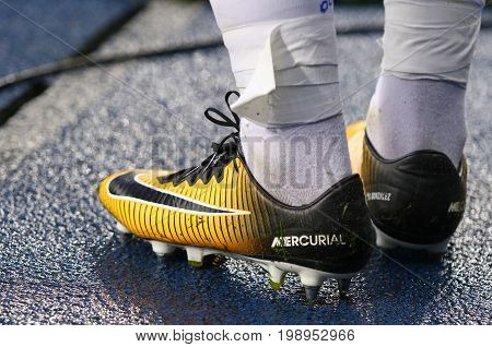 KYIV UKRAINE - JULY 26 2017: Close-up boots (Nike Mercurial) of footballer Derlis Gonzalez of FC Dynamo Kyiv during UEFA Champions League 3rd qualifying round game against Young Boys