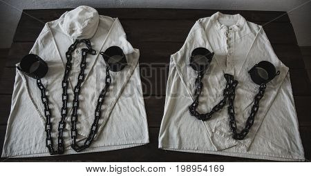 Prison Shackles on a White Shirt Russia