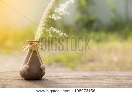 Grass Flower in the vase selective focus Environment concept World saving concept