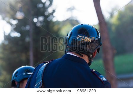 Two italian police men on horses at the collosseum
