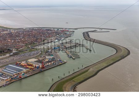 Aerial View Houses And Harbor Harlingen, Dutch Village At Wadden Sea