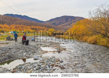 Malkinskiye Hot Springs, Malka, Russia- 27 September 2014: People In A Hot Springs In The Center Kam
