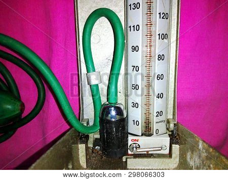 Blood Pressure Machine For The Patient Showing The Mercury Tube With Rubber Pipes.