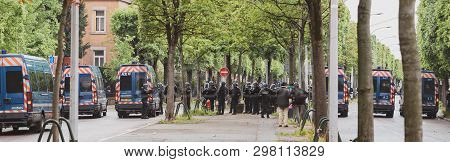 Strasbourg, France - Apr 28, 2019: Rear View Of Squadron Of Police Officers Securing The Alee De Rob