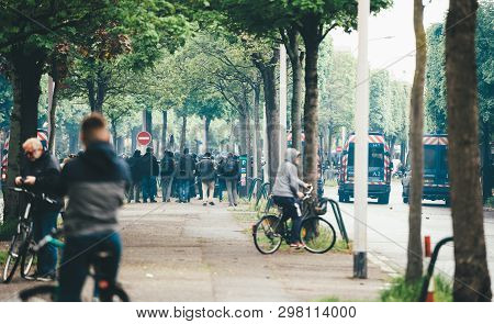 Strasbourg, France - Apr 28, 2019: Rear View Of Journalists Near Police Gendarmerie Securing Allee D