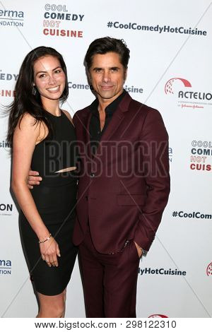 LOS ANGELES - APR 25:  Caitlin McHugh, John Stamos at the Cool Comedy, Hot Cuisine 2019 at the Beverly Wilshire Hotel on April 25, 2019 in Beverly Hills, CA
