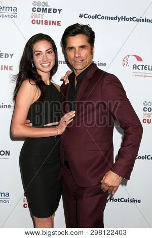 LOS ANGELES - APR 25:  Caitlin McHugh, John Stamos at the Cool Comedy, Hot Cuisine 2019 at the Beverly Wilshire Hotel on April 25, 2019 in Beverly Hills, CA