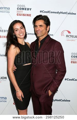 LOS ANGELES - APR 25:  Caitlin McHugh, John Stamos at the Cool Comedy, Hot Cuisine 2019 at the Beverly Wilshire Hotel on April 25, 2019 in Beverly Hills, CA