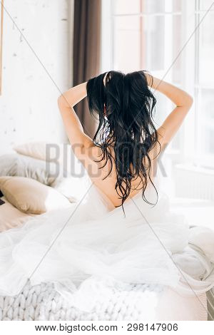 Boudoir Portrait Of Beautiful Bride. Bride Wedding Morning.