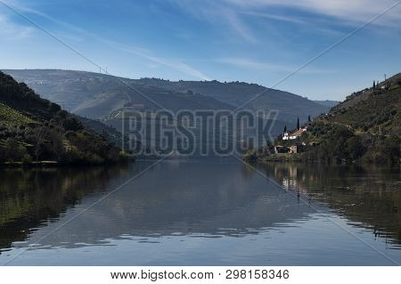 View Of Douro River With Terraced Vineyards Near The Village Of Pinhao, In Portugal; Concept For Tra