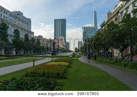 Ho Chi Minh City, Vietnam - August 25, 2017: People Jogging On Walking Street Nguyen Hue In Ho Chi M