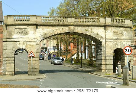 Chester, Cheshire, England, Uk, Europe - April 19, 2019 : Chester Bridgegate Part Of The Roman Walls