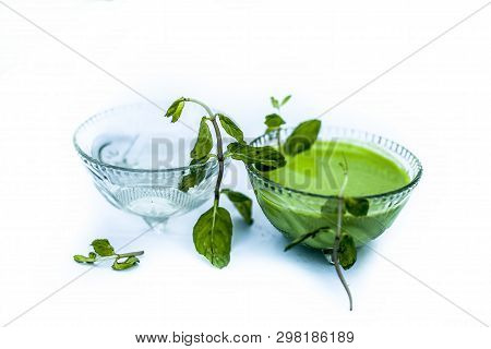 Best Home Remedy Or Treatment To Reduce Rashes Isolated On White Consisting Of Mint And Water In A G
