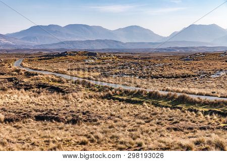 Trail In A Bog With Twelve Bens Mountains In Background