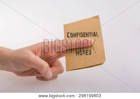 Brown Paper  Text Confidental On A White Background
