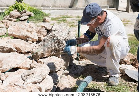 Maruggio, Italy - April 28, 2019 - Construction Of A Low Wall - Old Traditional Apulian Architectura