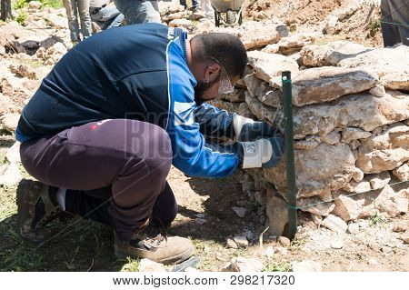 Maruggio, Italy - April 28, 2019 - Construction Of A Low Wall - Old Traditional Apulian Architectura