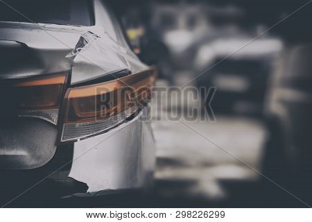 Uninsured Car, Repaired With Adhesive Tape, The Headlight And Its Parts Stick Out