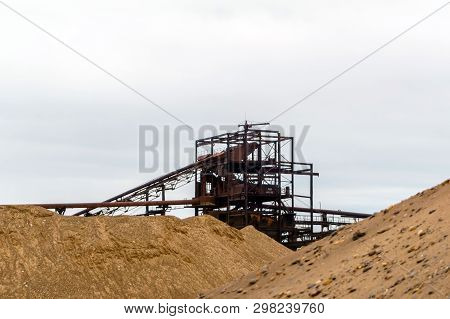 Desert Industrial Landscape With Stationary Rusty Gravitational Separator Of Sand And Gravel On The 