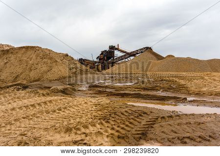 Desert Industrial Landscape With Stationary Rusty Gravitational Separator Of Sand And Gravel On The 