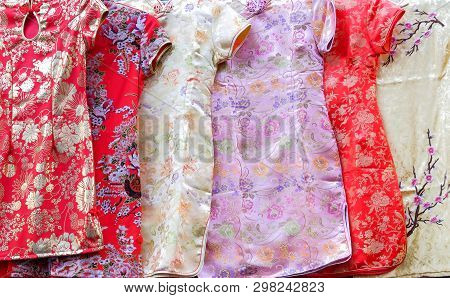 Group Of Qipao Dress (chinese Dress) For Women. Qipao Dress Is Costume For Wear In The Chinese New Y