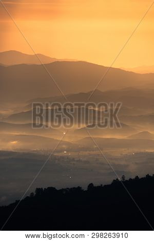 Beautiful Mountain And Morning Sunrise Over The Sea Of Mist. Mon Sone View Point , Doi Pha Hom Pok N