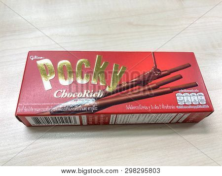 Bangkok Thailand - 29 April 2019: Glico Pocky Biscuit Sticks Box On The Wood Table